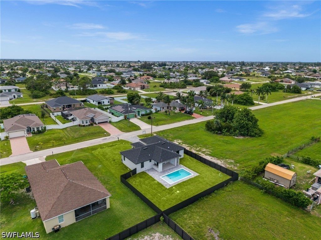 Image 44 of property listing at 409 NW 25TH PL, Cape Coral, FL 33993