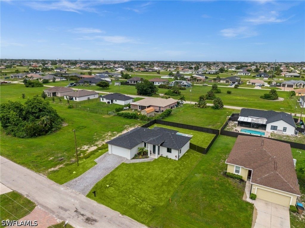Image 5 of property listing at 409 NW 25TH PL, Cape Coral, FL 33993