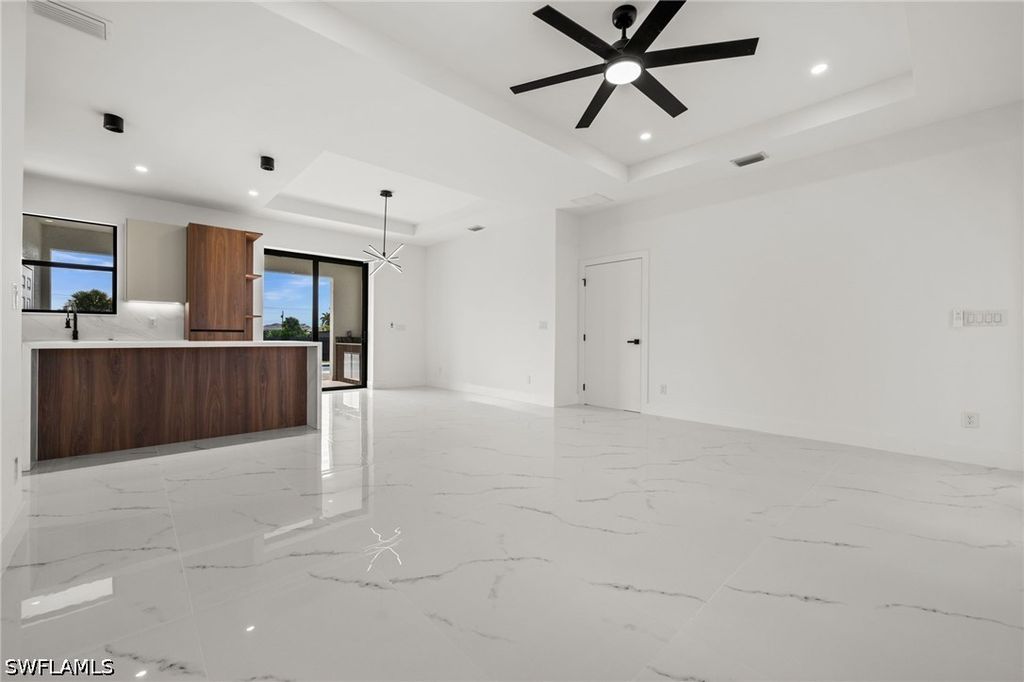 Image 7 of property listing at 409 NW 25TH PL, Cape Coral, FL 33993