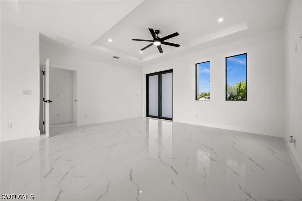 Image 8 of property listing at 409 NW 25TH PL, Cape Coral, FL 33993