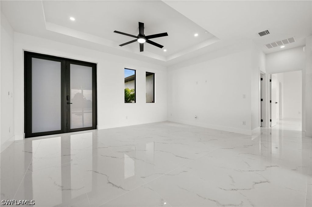 Image 9 of property listing at 409 NW 25TH PL, Cape Coral, FL 33993