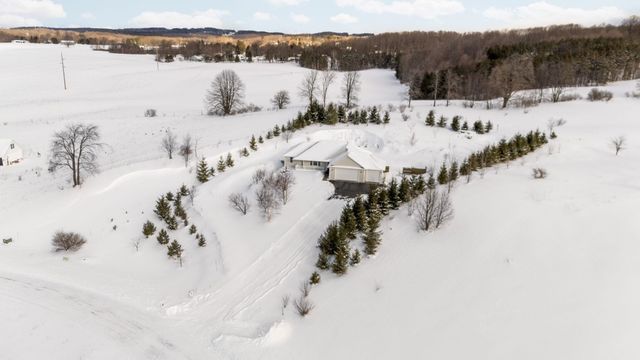 2424 Tyler Hills Drive, Long Lake Twp, MI 49685