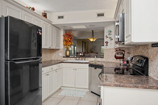 23370 N Carolwood Lane N 409, Boca Raton, FL 33428