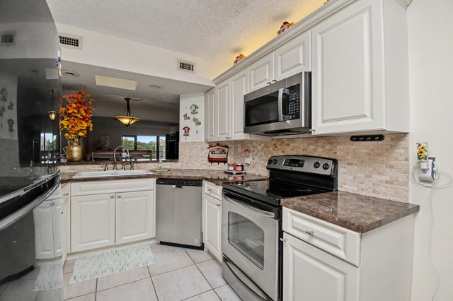23370 N Carolwood Lane N 409, Boca Raton, FL 33428