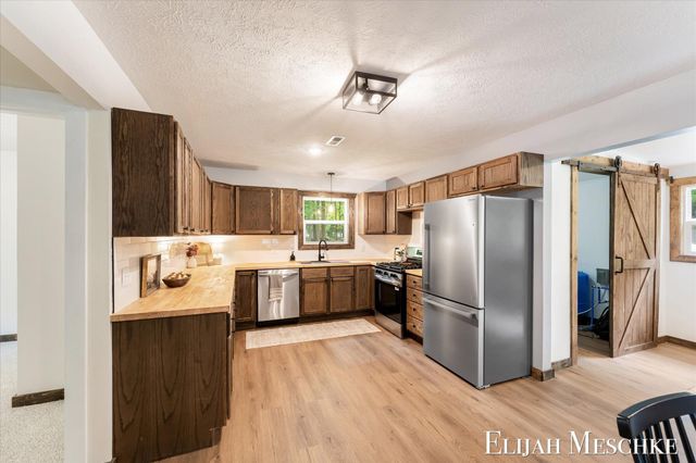 8938 Mackinaw Trail Drive, Howard City, MI 49329