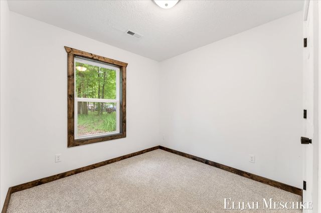 8938 Mackinaw Trail Drive, Howard City, MI 49329