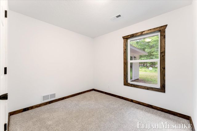 8938 Mackinaw Trail Drive, Howard City, MI 49329