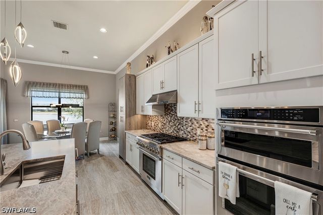 7478 Winding Cypress DR, Naples, FL 34114