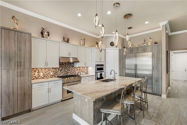 7478 Winding Cypress DR, Naples, FL 34114