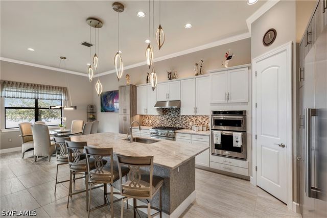 7478 Winding Cypress DR, Naples, FL 34114