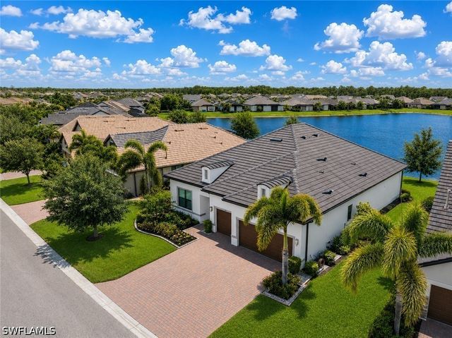 7478 Winding Cypress DR, Naples, FL 34114