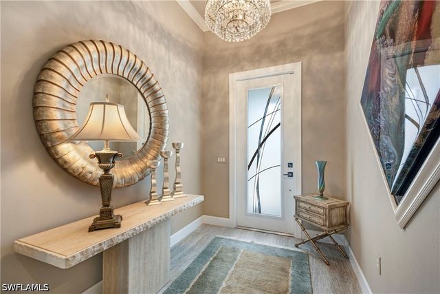 7478 Winding Cypress DR, Naples, FL 34114
