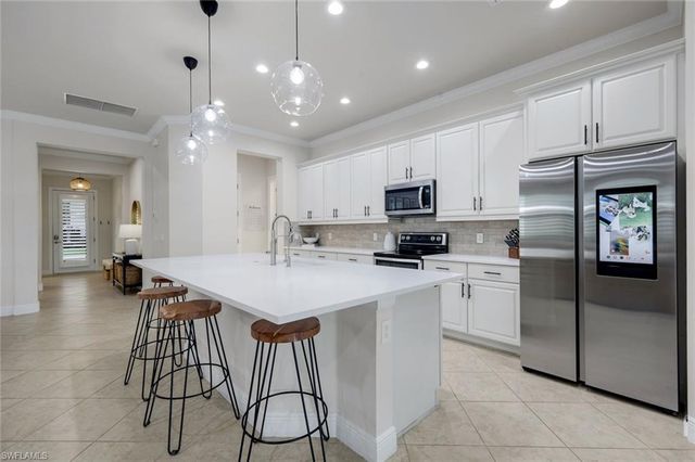 4118 Raffia DR, Naples, FL 34119