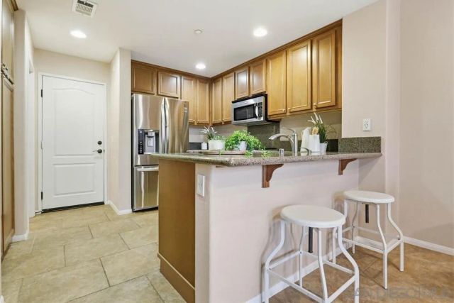 17059 Calle Trevino 5, San Diego, CA 92127