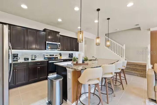8923 SYDNEY AVENUE, Kissimmee, FL 34747
