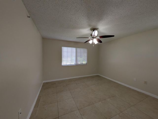 5011 Wiles Road 208, Coconut Creek, FL 33073