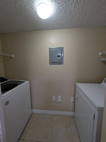 5011 Wiles Road 208, Coconut Creek, FL 33073
