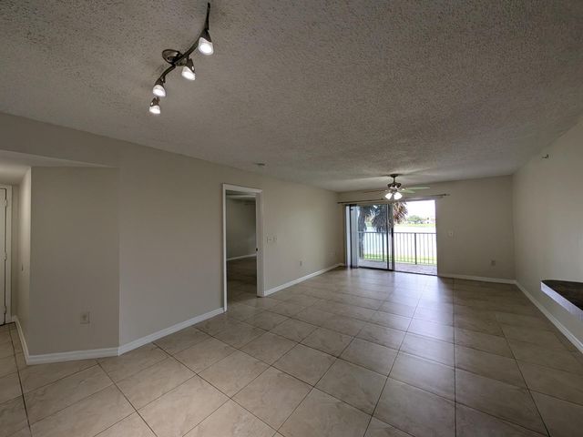 5011 Wiles Road 208, Coconut Creek, FL 33073