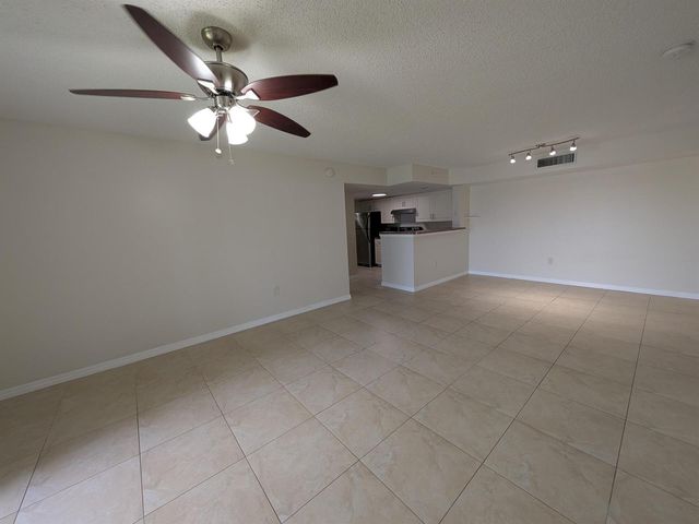 5011 Wiles Road 208, Coconut Creek, FL 33073