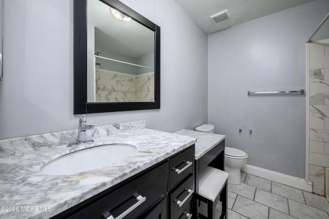 25 Rambling Meadow Court, Tinton Falls, NJ 07724