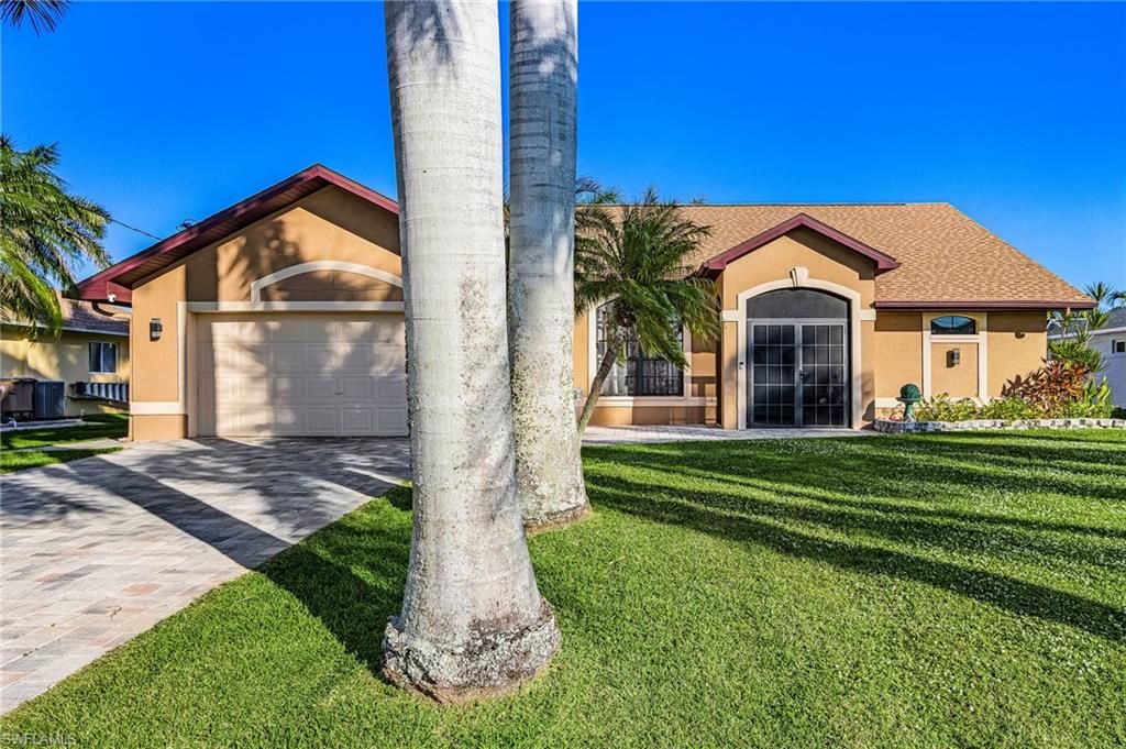 Image 2 of property listing at 4841 SW 24th PL, Cape Coral, FL 33914