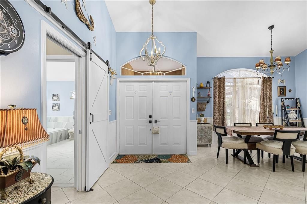 Image 6 of property listing at 4841 SW 24th PL, Cape Coral, FL 33914