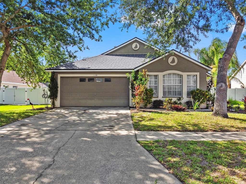 Image 1 of property listing at 1239 AVONWOOD COURT, Lutz, FL 33559