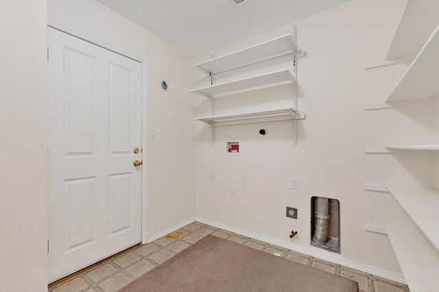 746 Loma Pinon Loop NE, Rio Rancho, NM 87144