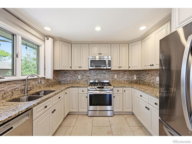 8241 W Pomona Drive, Arvada, CO 80005