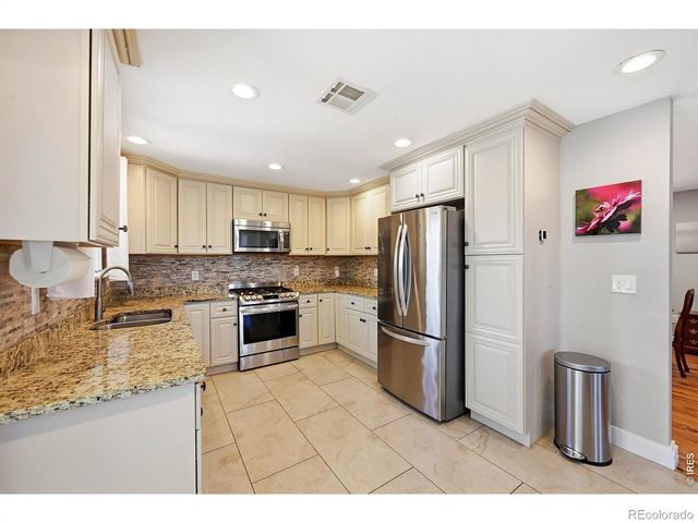 8241 W Pomona Drive, Arvada, CO 80005