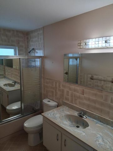 4703 Rainbow Drive, Greenacres, FL 33463