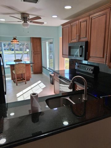 4703 Rainbow Drive, Greenacres, FL 33463