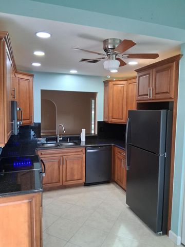 4703 Rainbow Drive, Greenacres, FL 33463