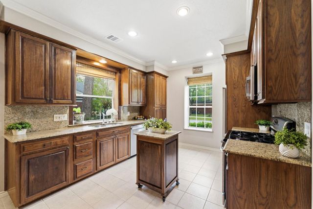 77 W Night Heron Place, The Woodlands, TX 77382