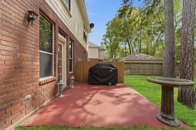 77 W Night Heron Place, The Woodlands, TX 77382