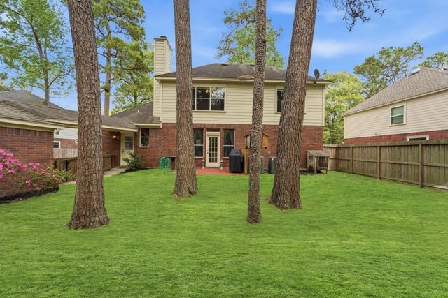 77 W Night Heron Place, The Woodlands, TX 77382