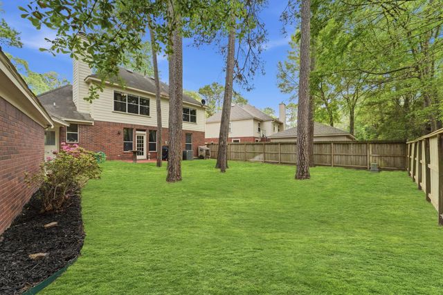 77 W Night Heron Place, The Woodlands, TX 77382