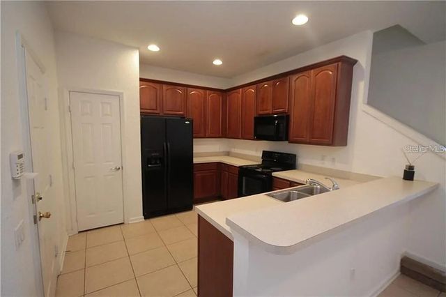 1682 SHALLCROSS AVENUE, Orlando, FL 32828
