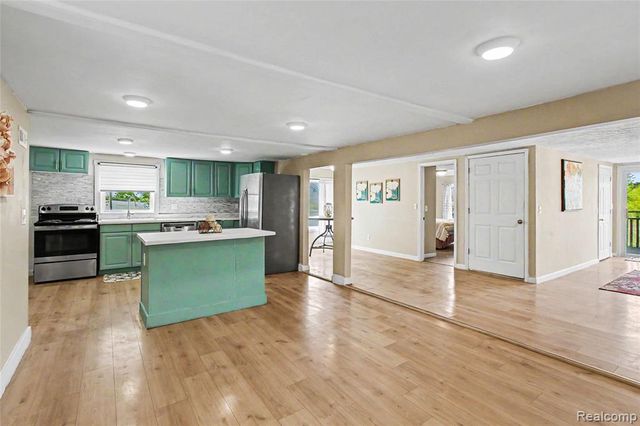 9433 E Lovejoy Road, Perry, MI 48872