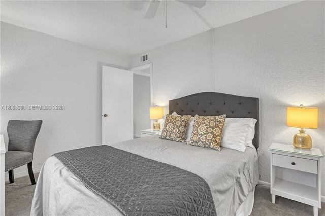 325 Pine Ridge Cir D-1, Green Acres, FL 33463