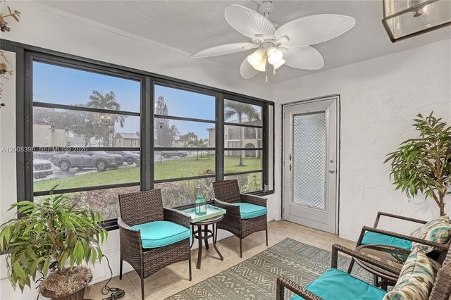 325 Pine Ridge Cir D-1, Green Acres, FL 33463