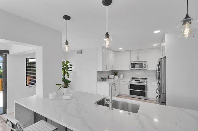 1660 Twelve Oaks Way 101 & 50 Ft. Dock & 30k L, North Palm Beach, FL 33408