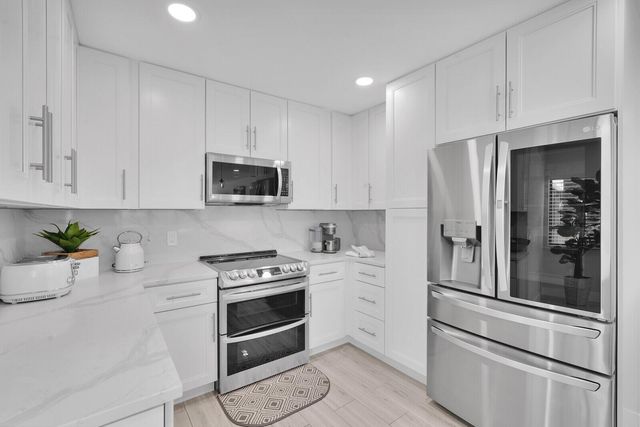 1660 Twelve Oaks Way 101 & 50 Ft. Dock & 30k L, North Palm Beach, FL 33408