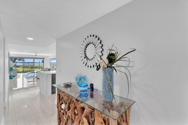 1660 Twelve Oaks Way 101 & 50 Ft. Dock & 30k L, North Palm Beach, FL 33408