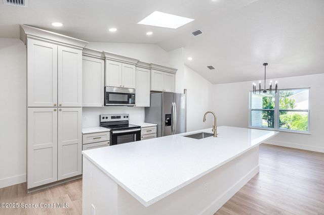 1207 Dallam Avenue NW, Palm Bay, FL 32907