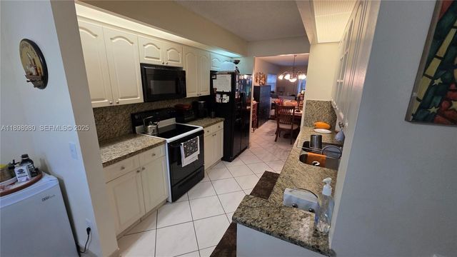 12955 SW 16th Court 101M, Pembroke Pines, FL 33027