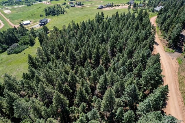 13665 Woodmoor West Drive, Larkspur, CO 80118