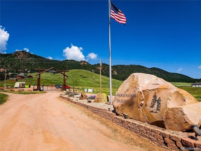 13665 Woodmoor West Drive, Larkspur, CO 80118