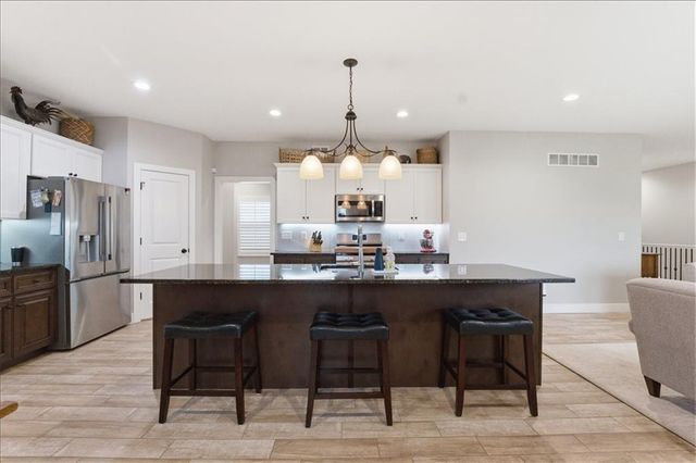 720 Gamma Grass Place, Raymore, MO 64083