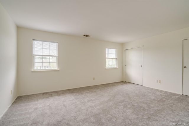 122 Woodlake Drive W, Woodbury, NY 11797
